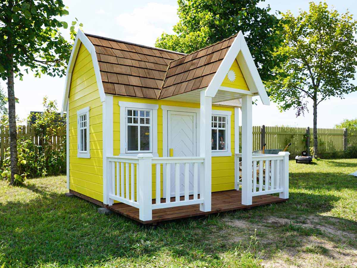 a yellow playhouse with a porch in horse cave ky
