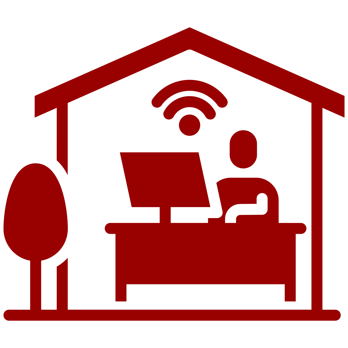 man working inside home office at computer on desk