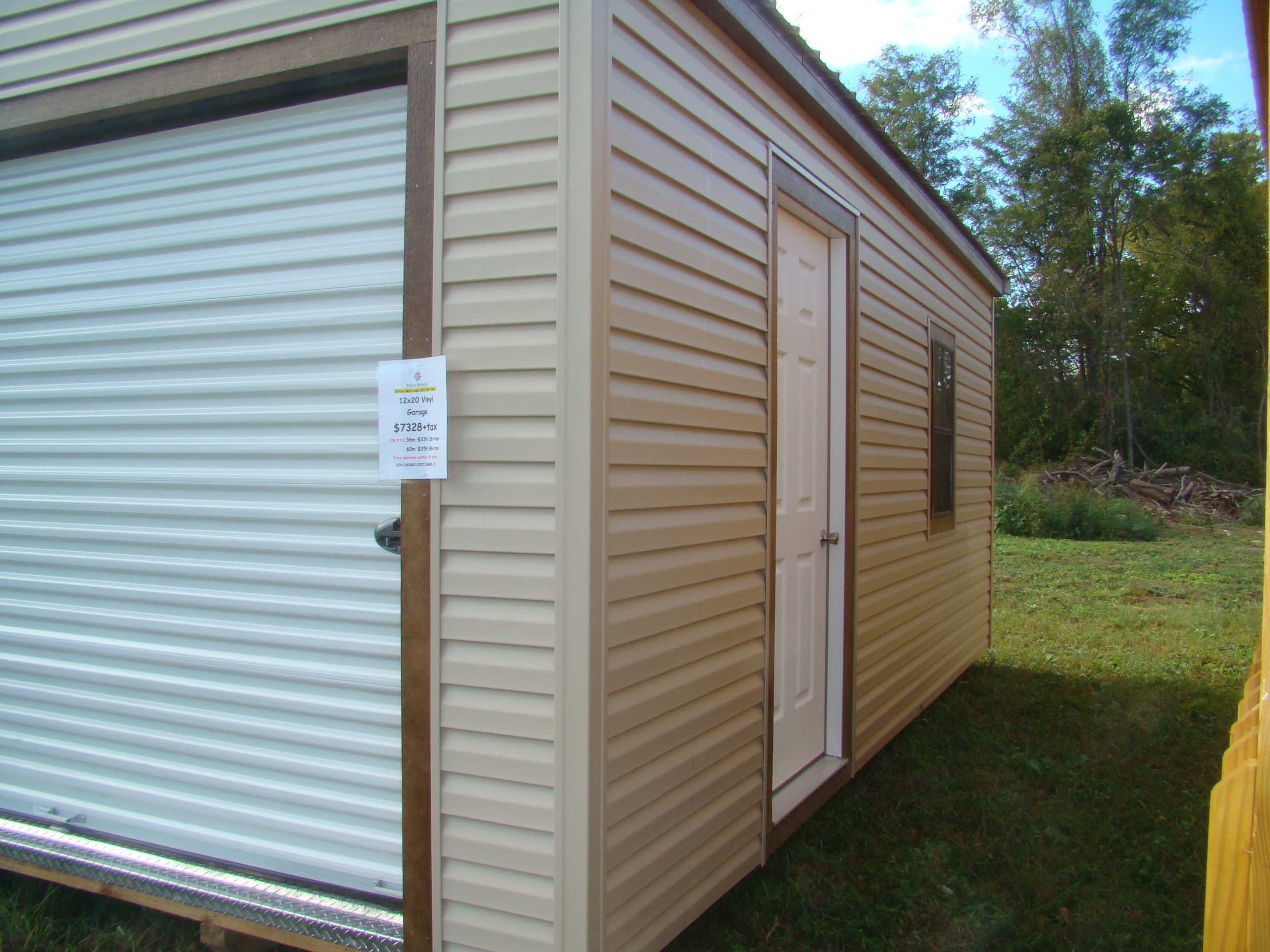 side view of tan 12x20 vinyl garage