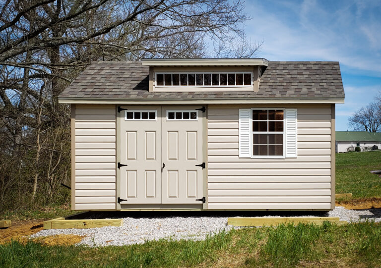 tan 8x8 utility shed with dormer and shingle roof
