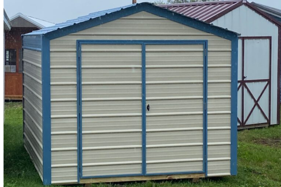 tan and blue trimmed 9x12 shed with double doors